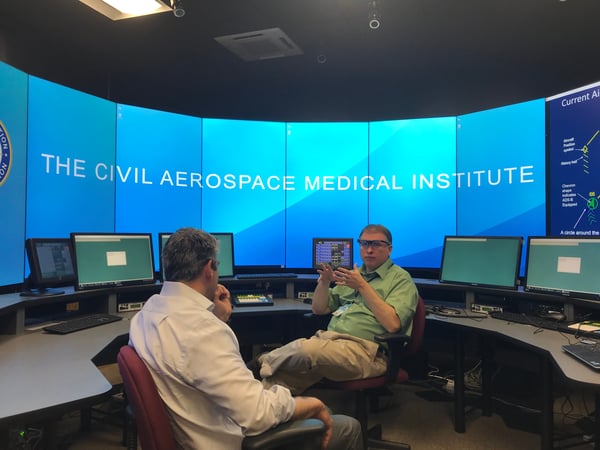 Exaptive CEO Dave King listens at an FAA lab in Oklahoma City